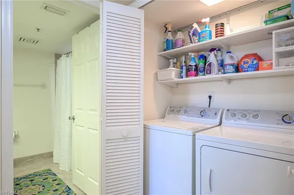 a view of a livingroom with furniture and a table