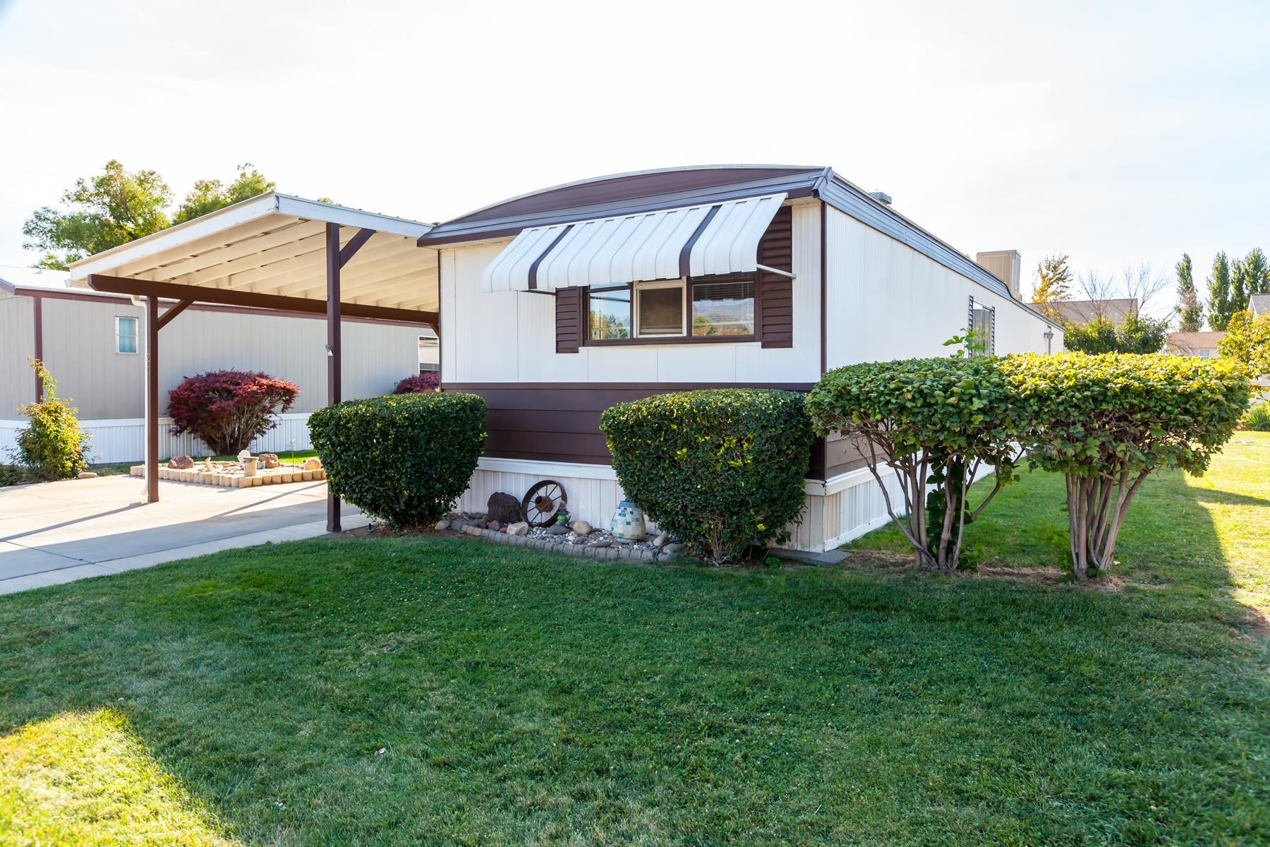 3251 E Road, Unit 20 Clifton, CO 81520 - Photo 3 of 26 a front view of a house with garden