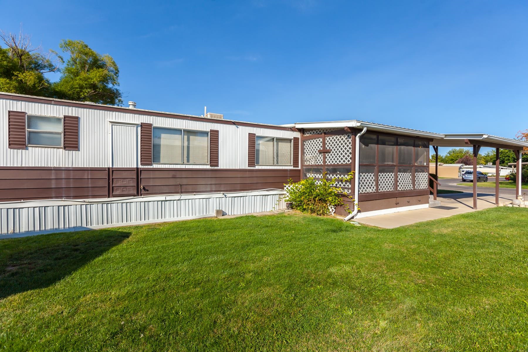 3251 E Road, Unit 20 Clifton, CO 81520 - Photo 5 of 26 a view of a house with backyard and porch