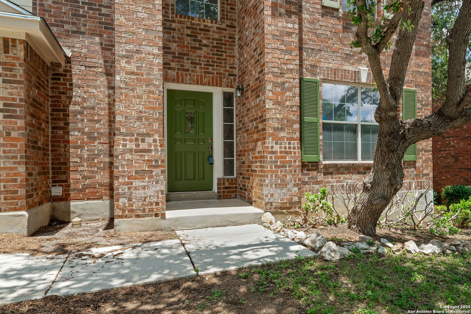 4731 Bending Grove San Antonio, TX 78259 - Photo 2 of 43 a front view of a house with a yard