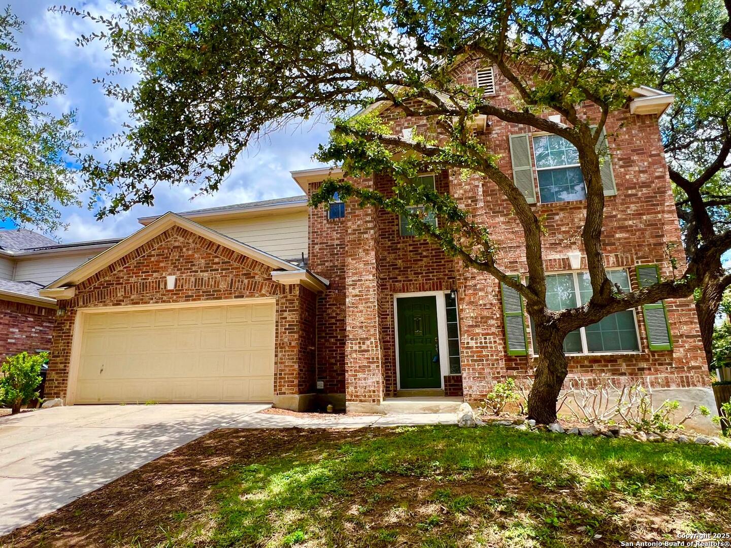 4731 Bending Grove San Antonio, TX 78259 - Photo 43 of 43 a front view of a house with a yard and garage