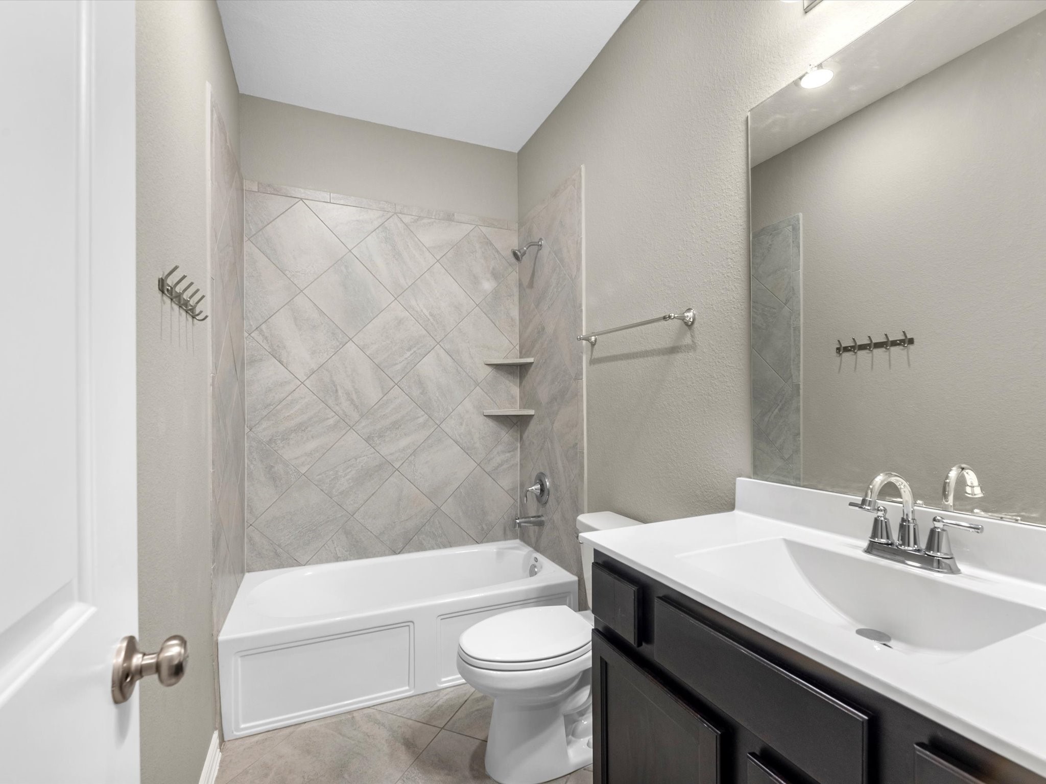 31120 Aspen Gate Trail Spring, TX 77386 - Photo 22 of 33 a bathroom with a sink a toilet and shower