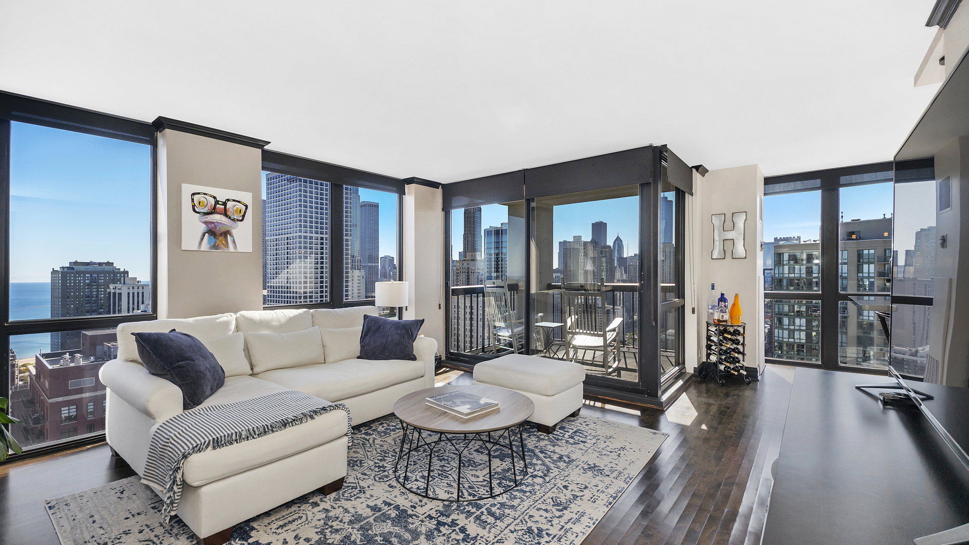 1122 North Clark Street, Unit 3808 Chicago, IL 60610 - Photo 3 of 29 a living room with furniture and a table
