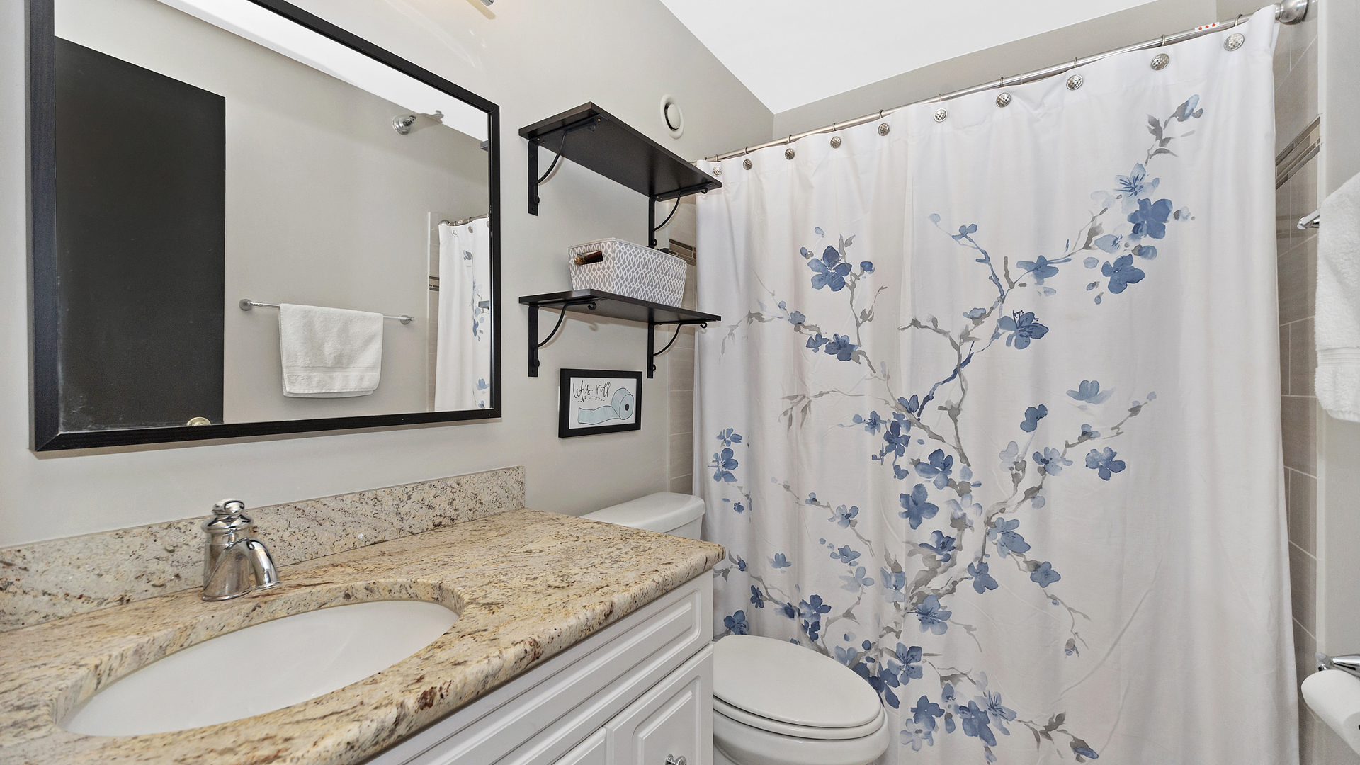 1122 North Clark Street, Unit 3808 Chicago, IL 60610 - Photo 22 of 29 a bathroom with a granite countertop sink toilet and shower