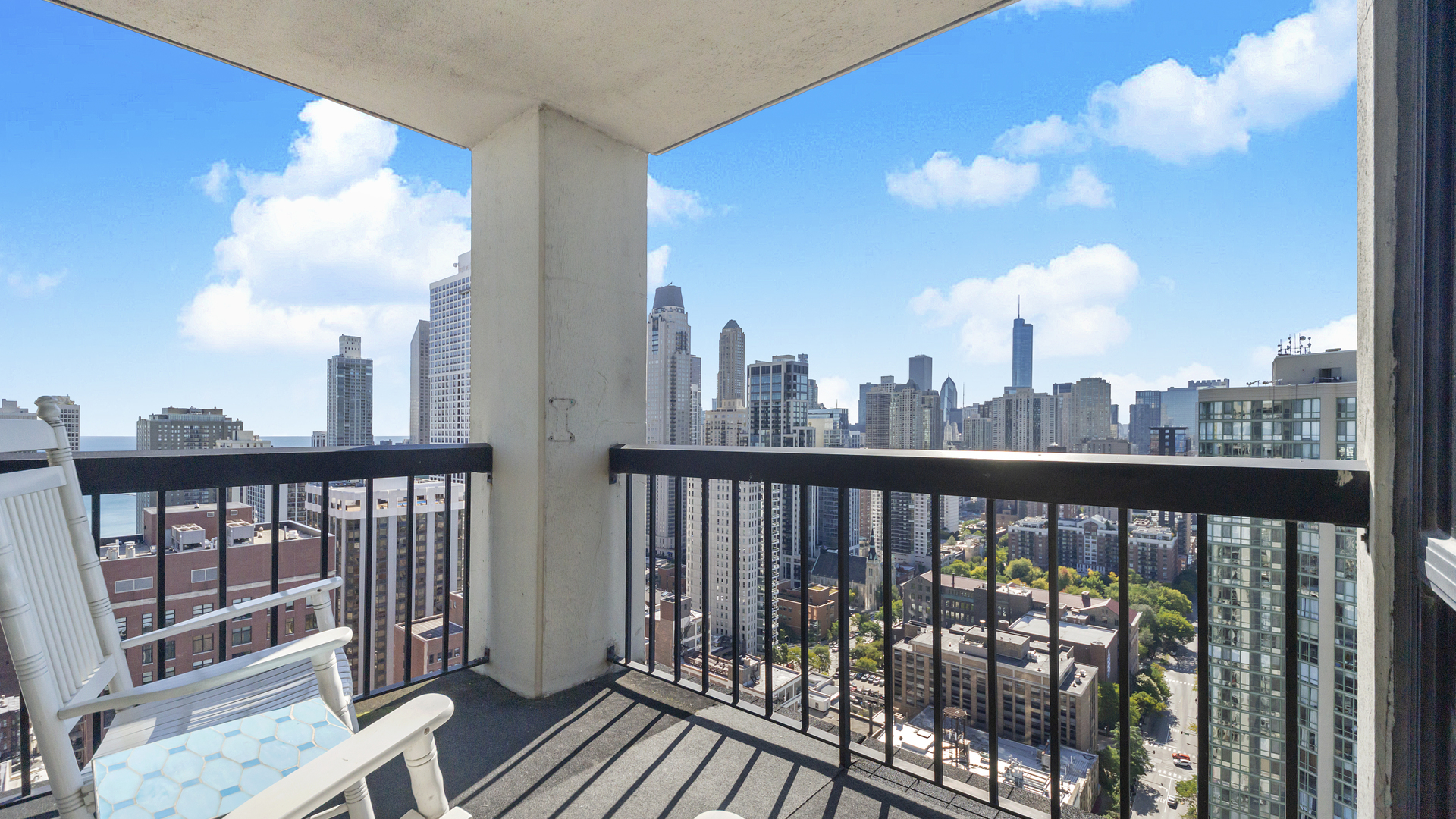 1122 North Clark Street, Unit 3808 Chicago, IL 60610 - Photo 23 of 29 a view of city from a balcony