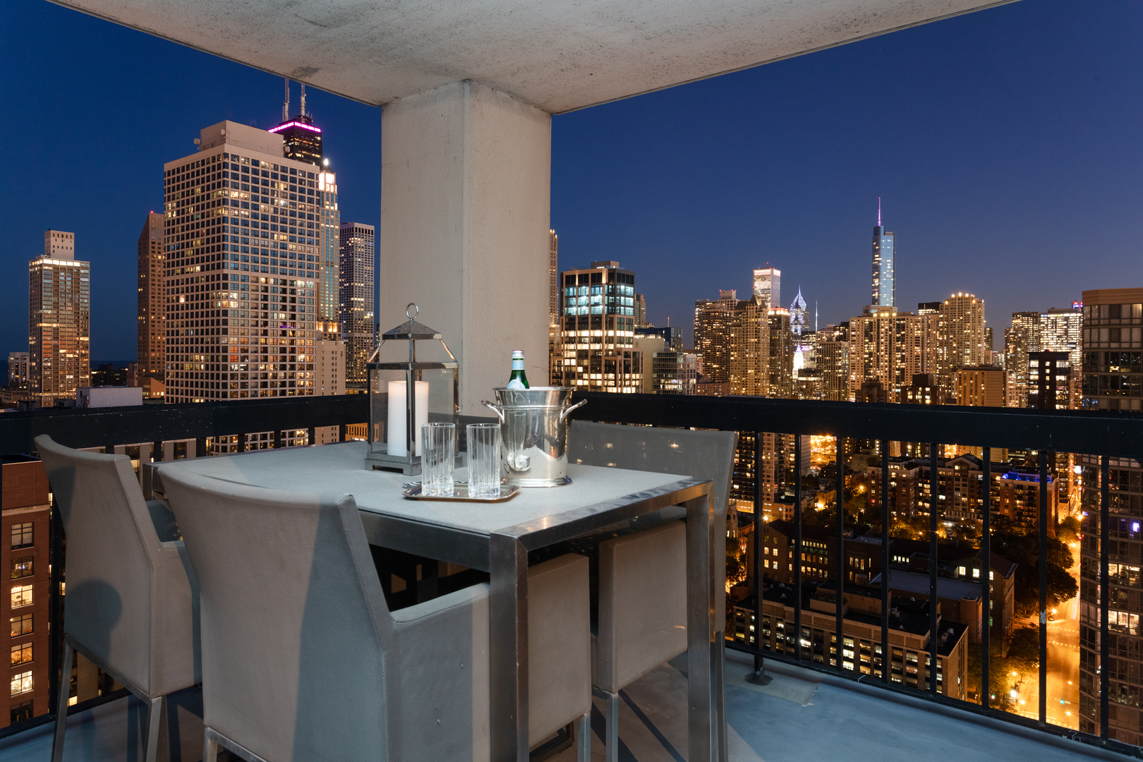 1122 North Clark Street, Unit 3808 Chicago, IL 60610 - Photo 26 of 29 a view of a dining room with furniture and window