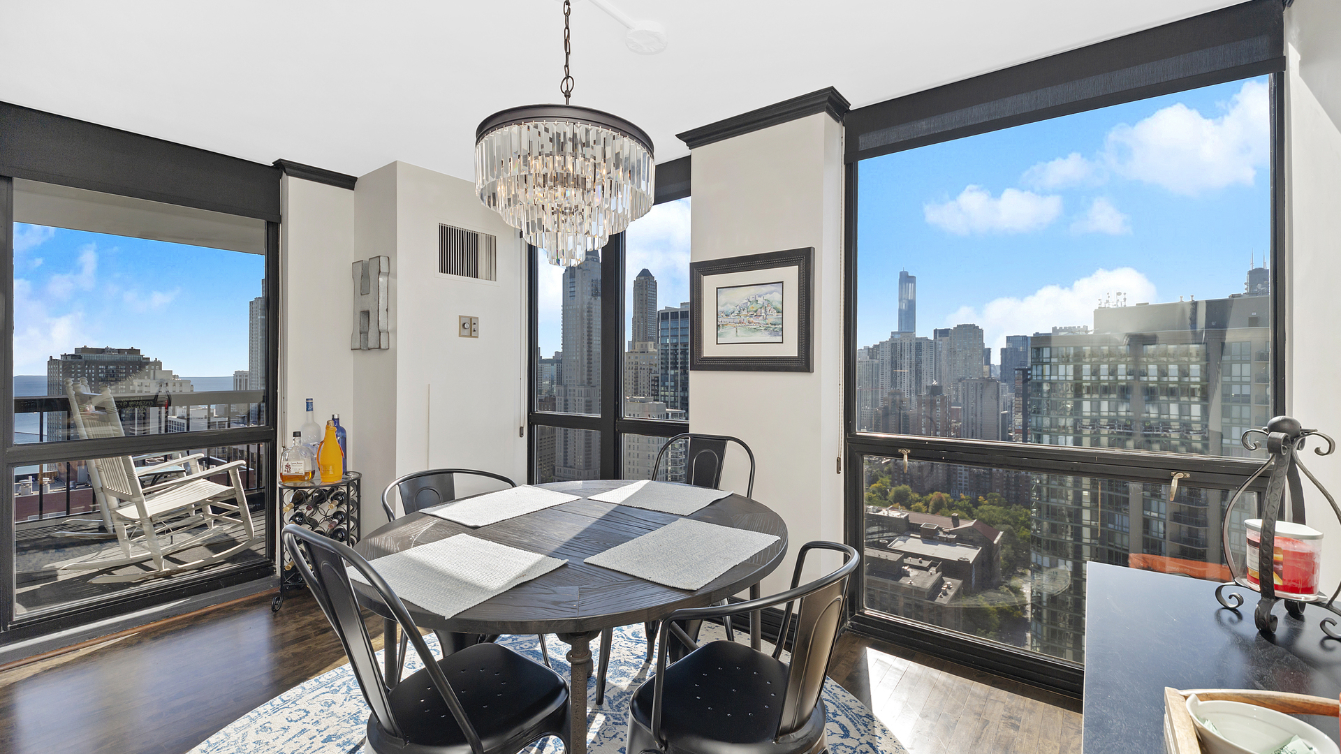 1122 North Clark Street, Unit 3808 Chicago, IL 60610 - Photo 7 of 29 a view of a dining room with furniture window and outside view