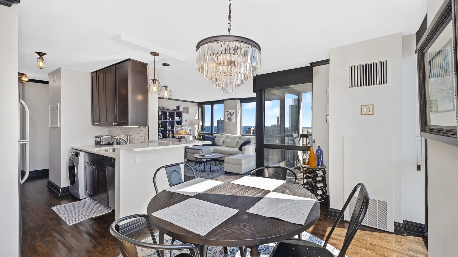 1122 North Clark Street, Unit 3808 Chicago, IL 60610 - Photo 9 of 29 a view of a dining room with furniture