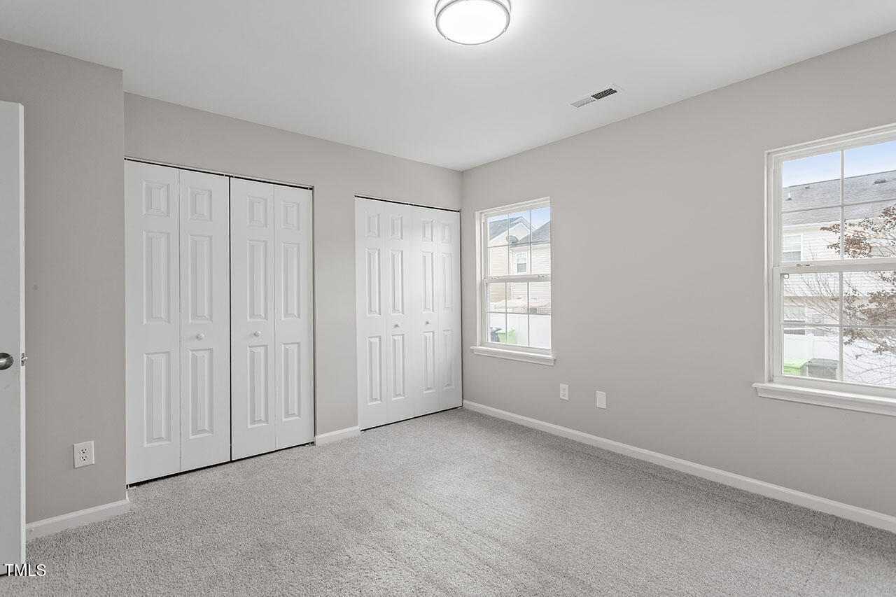 5340 Big Bass Drive Raleigh, NC 27610 - Photo 14 of 20 a view of an empty room with a window