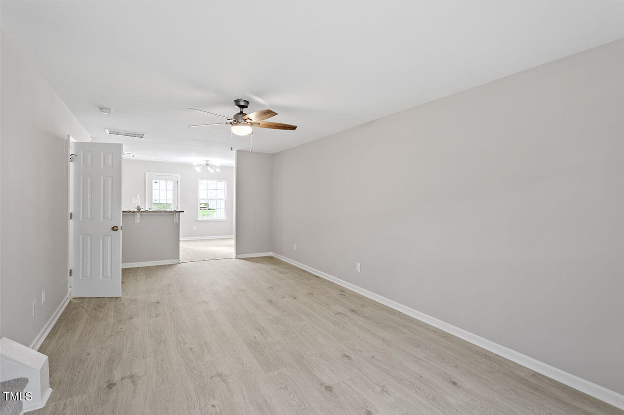 5340 Big Bass Drive Raleigh, NC 27610 - Photo 2 of 20 a view of a kitchen with a sink and a refrigerator