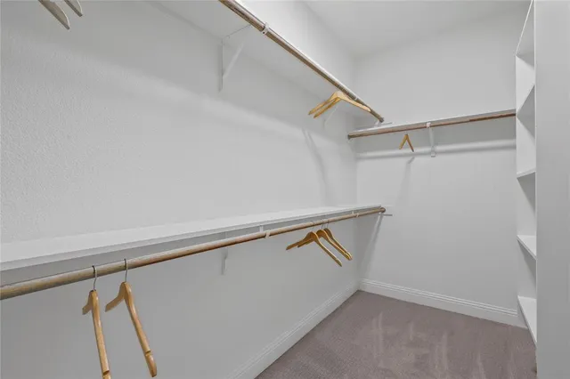 a bathroom with a sink and shower