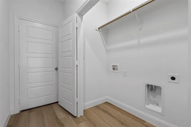 a bathroom with a bathtub and a sink