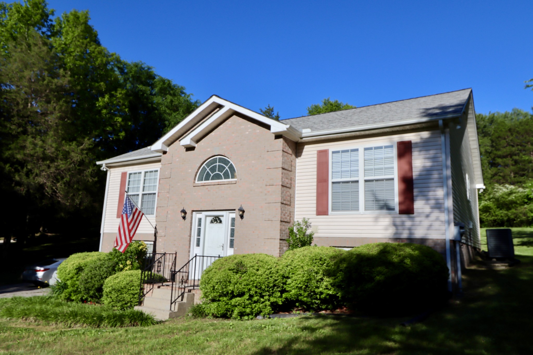7523 Chester Road Fairview, TN 37062 - Photo 1 of 53 a front view of a house with a yard