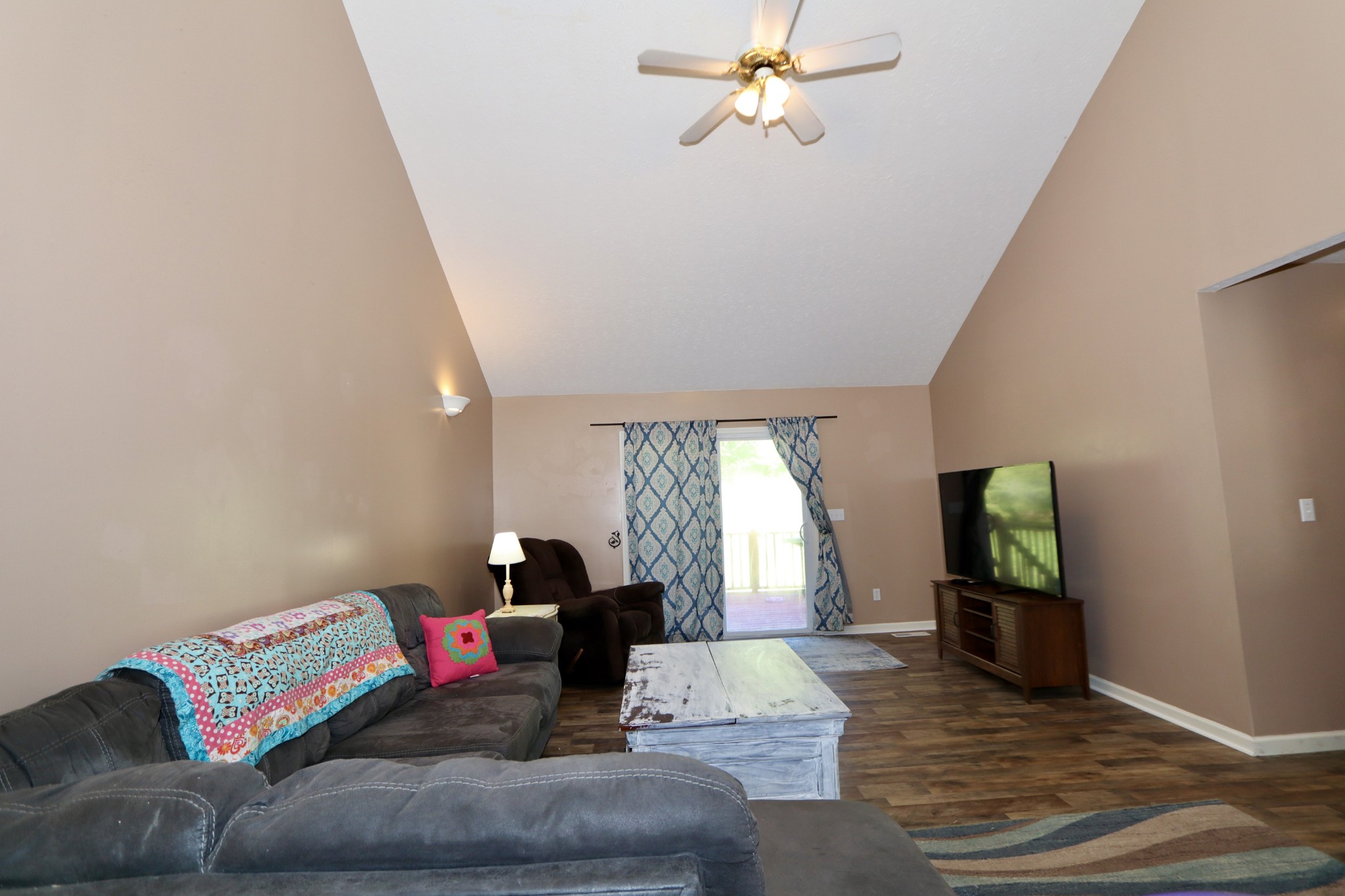 7523 Chester Road Fairview, TN 37062 - Photo 20 of 53 a living room with furniture and a wooden floor