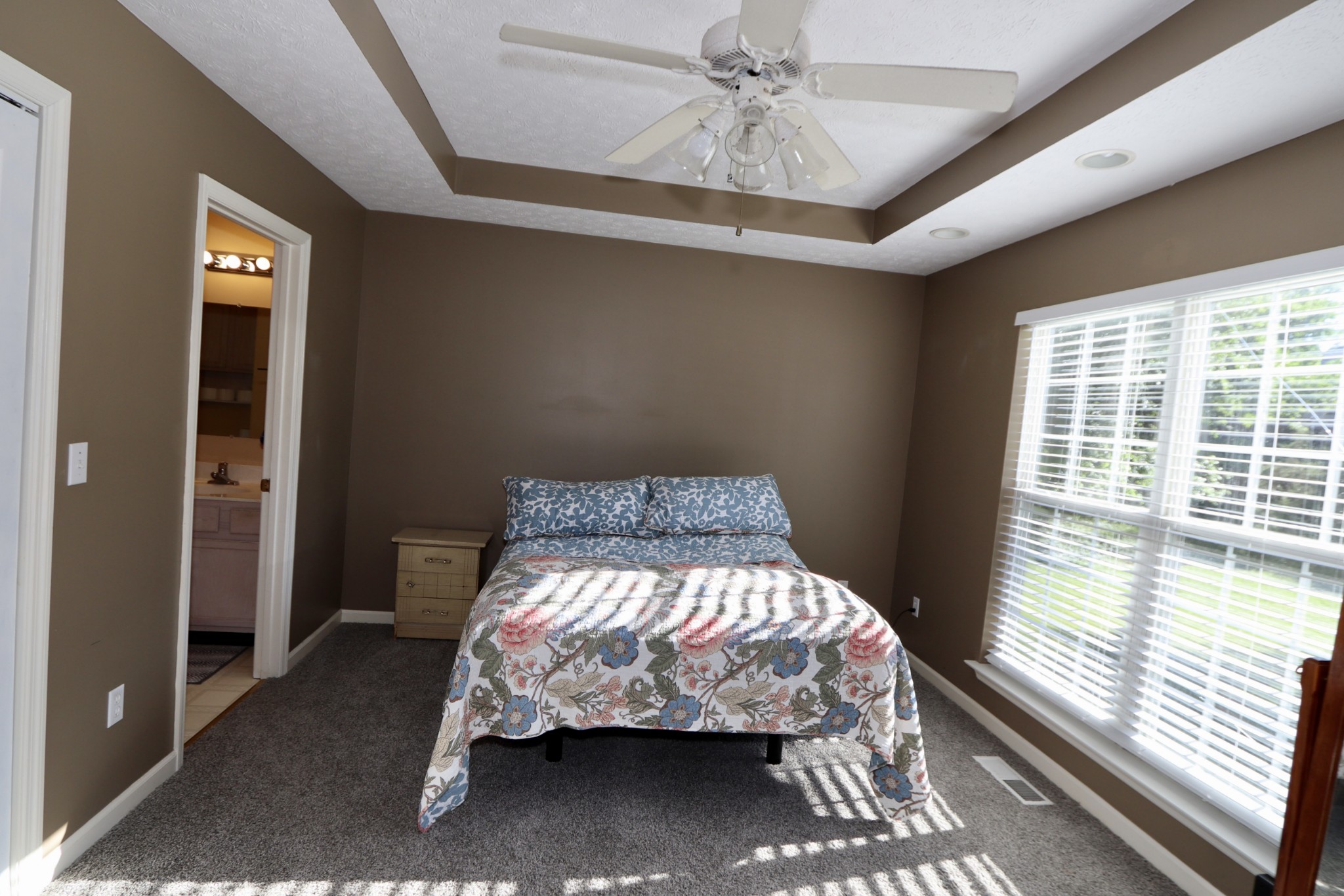 7523 Chester Road Fairview, TN 37062 - Photo 25 of 53 a bedroom with a bed and a window