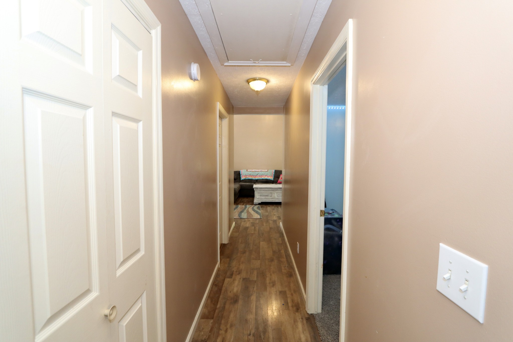 7523 Chester Road Fairview, TN 37062 - Photo 29 of 53 a view of a hallway with wooden floor and staircase