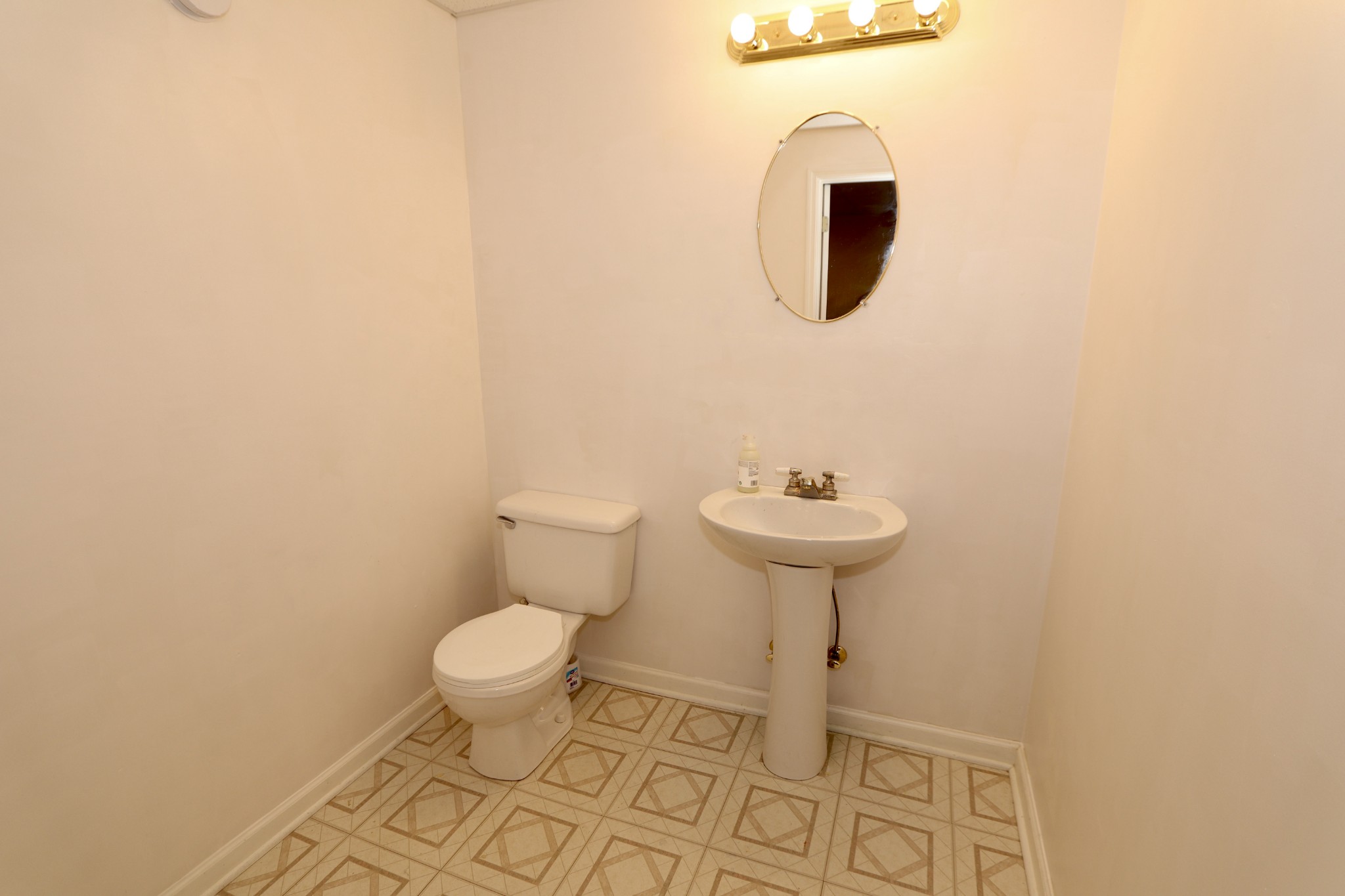 7523 Chester Road Fairview, TN 37062 - Photo 38 of 53 a bathroom with a toilet and a sink