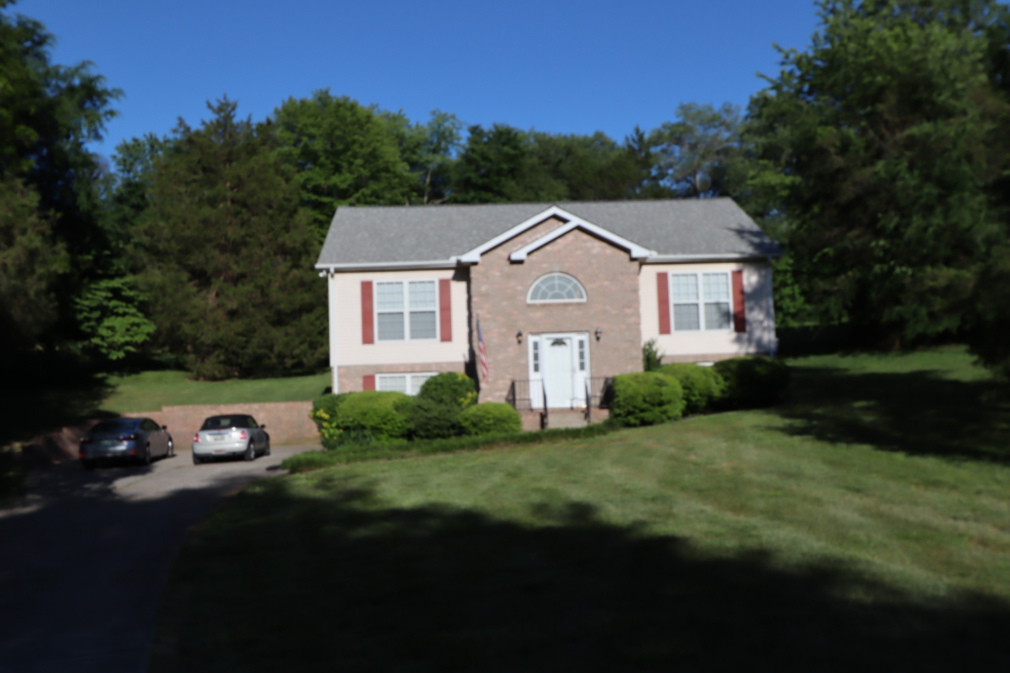 7523 Chester Road Fairview, TN 37062 - Photo 39 of 53 a front view of a house with a garden