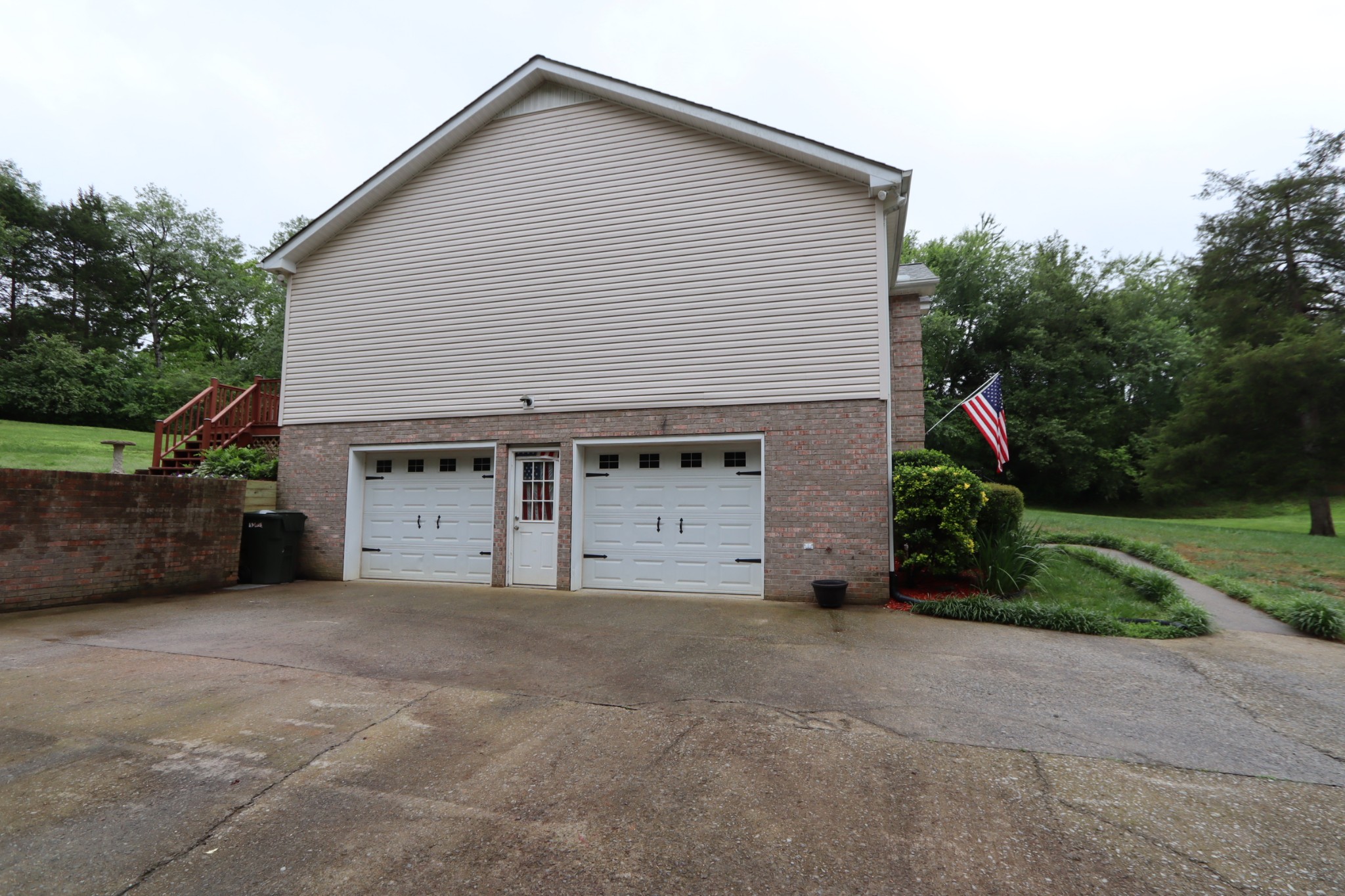 7523 Chester Road Fairview, TN 37062 - Photo 43 of 53 a view of a house with a yard and garage