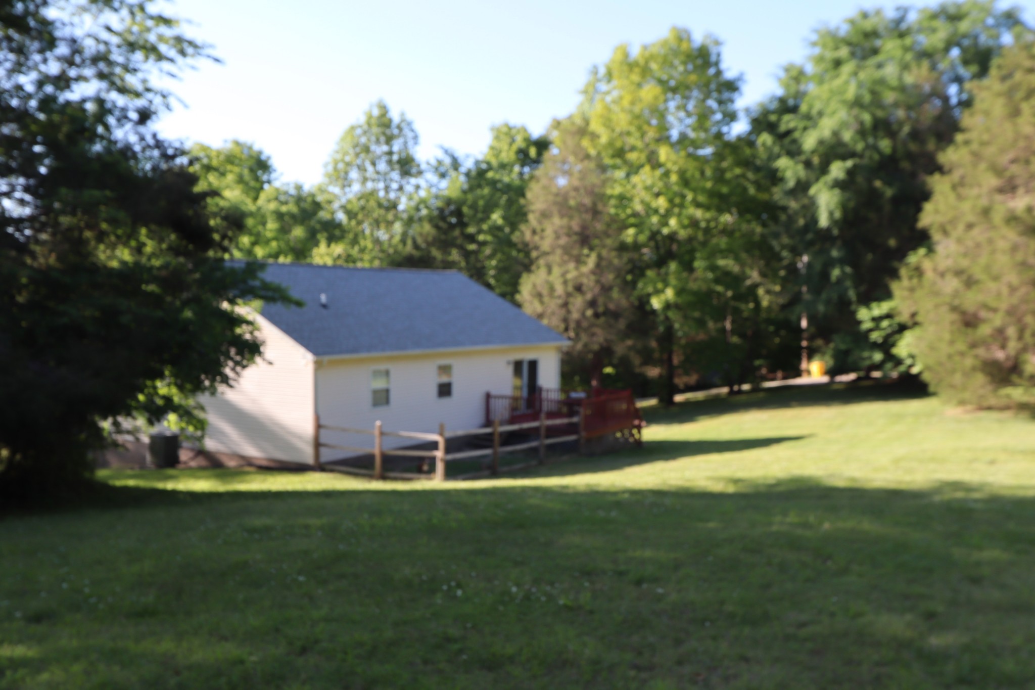 7523 Chester Road Fairview, TN 37062 - Photo 50 of 53 a view of a house with a yard porch and sitting area