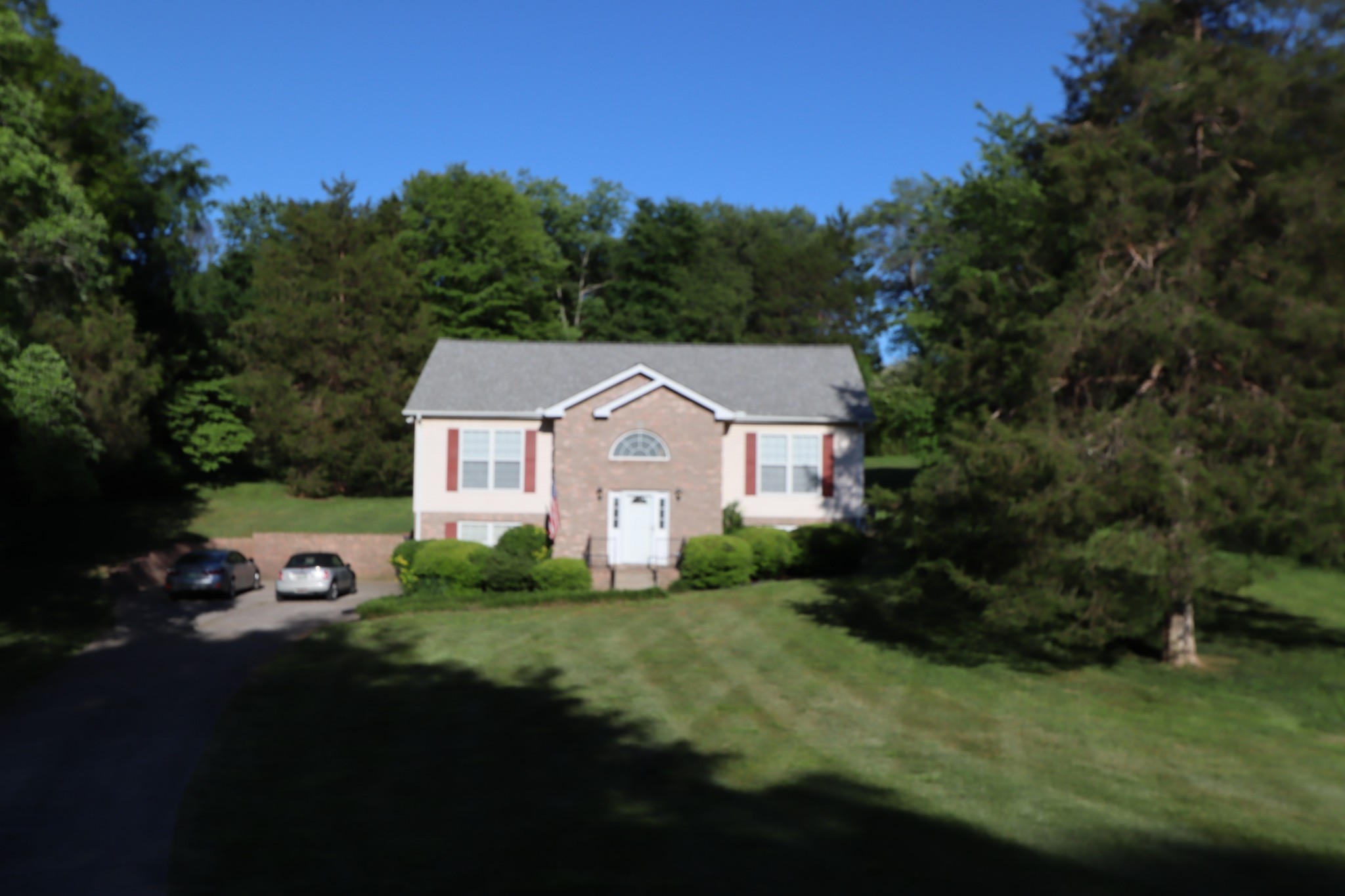 7523 Chester Road Fairview, TN 37062 - Photo 53 of 53 a front view of a house with garden