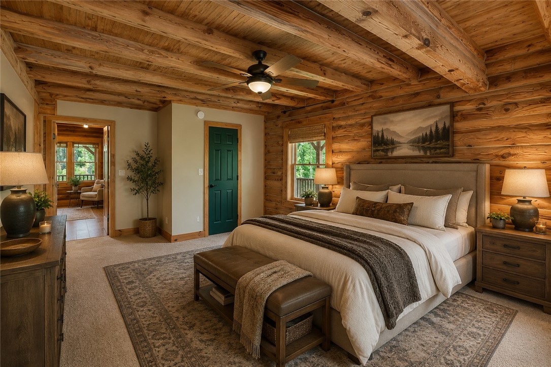 414 Devon Way Anderson, SC 29621 - Photo 14 of 50 Log walls and a beamed ceiling infuse this naturally illuminated primary suite with rustic charm.