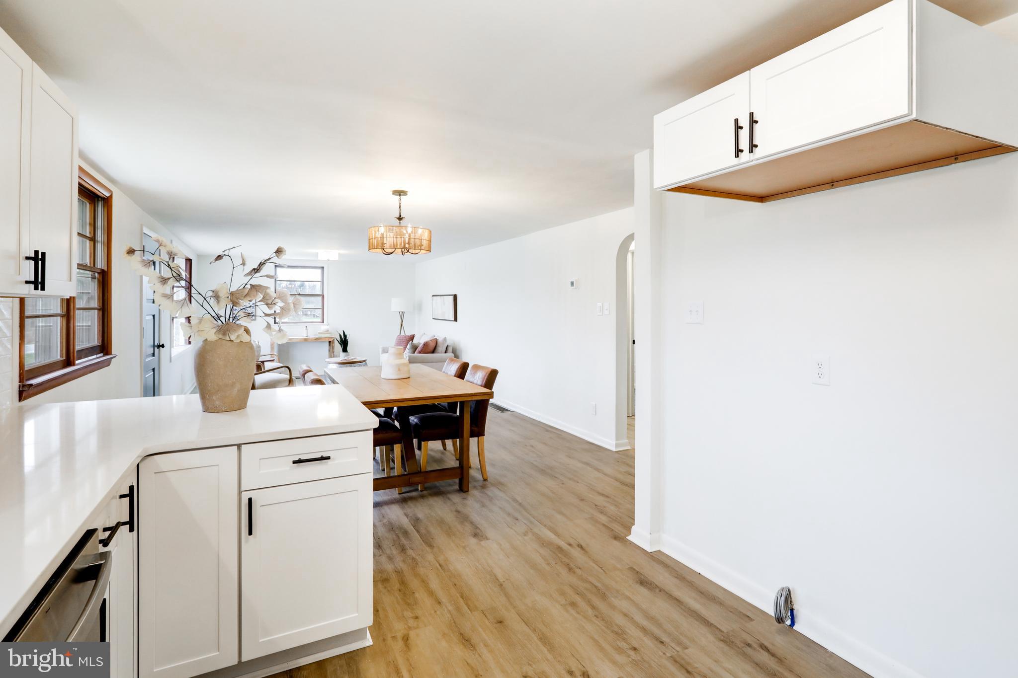 6428 York Road Spring Grove, PA 17362 - Photo 12 of 47 a kitchen with a sink cabinets and wooden floor