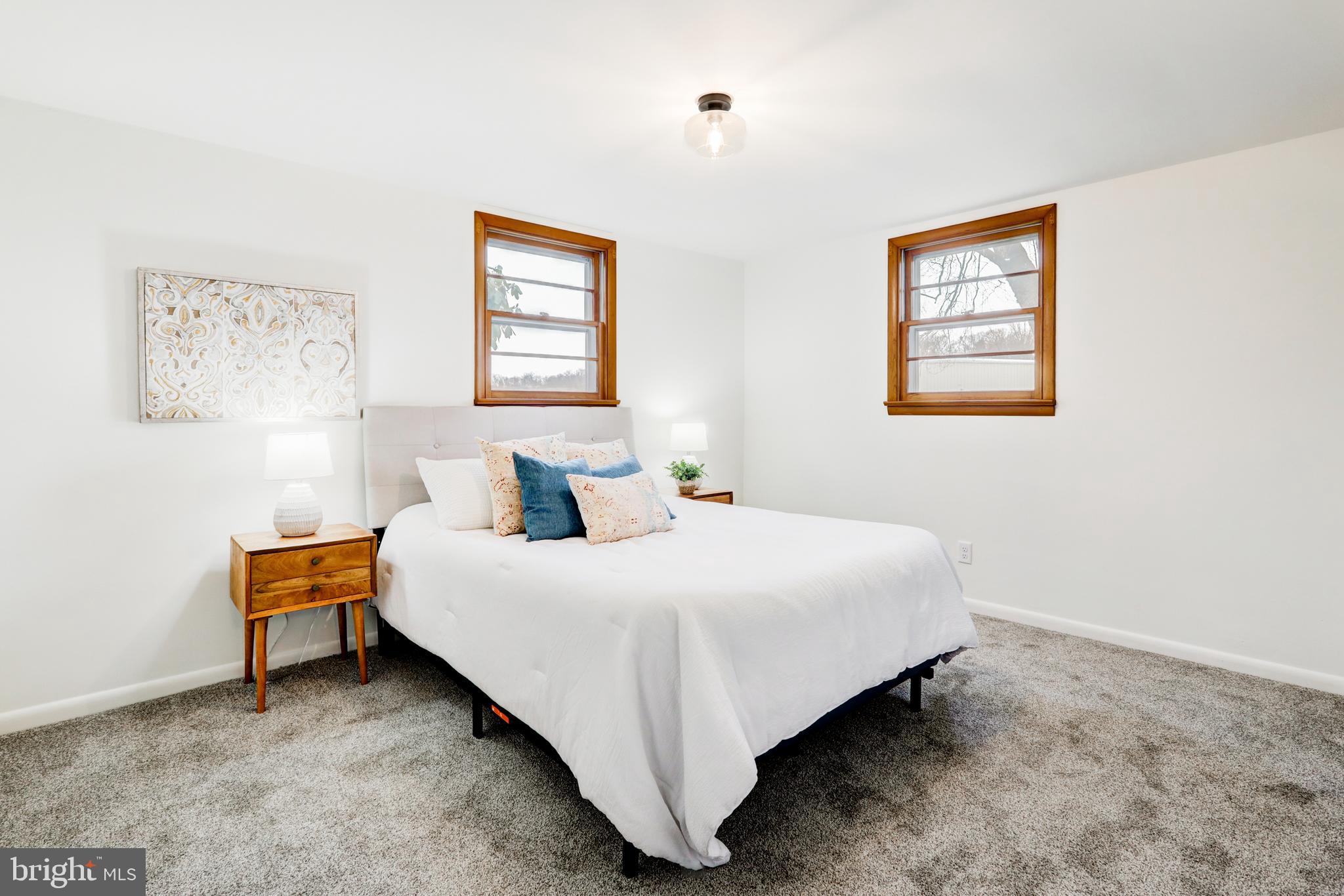 6428 York Road Spring Grove, PA 17362 - Photo 21 of 47 a large bed sitting in a bedroom next to a window