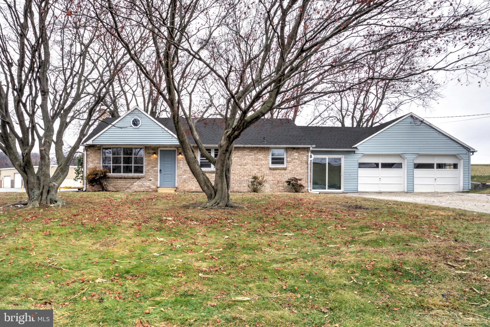 6428 York Road Spring Grove, PA 17362 - Photo 36 of 47 a front view of a house with a yard