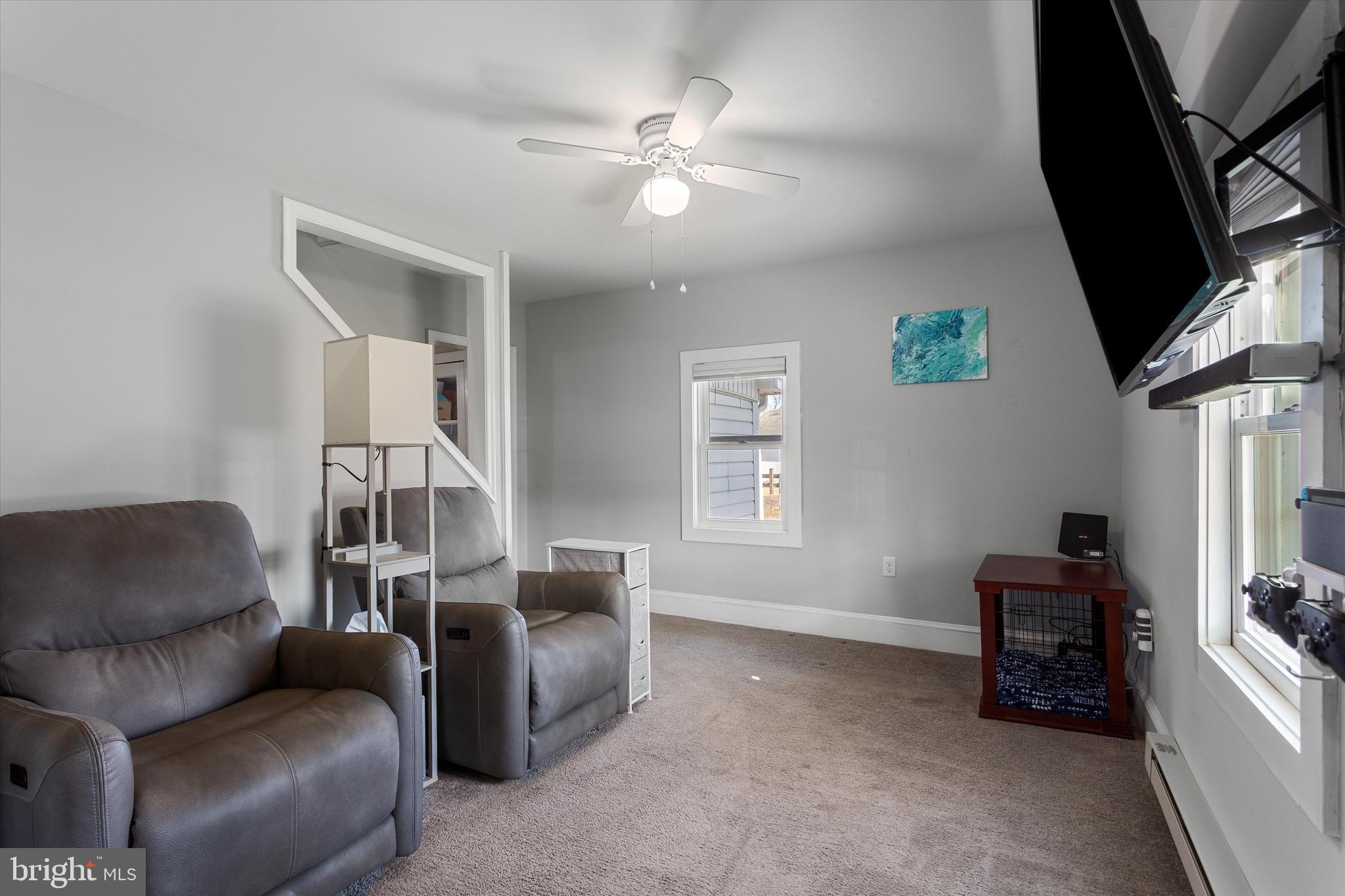 337 Old Charles Town Road Stephenson, VA 22656 - Photo 11 of 27 a living room with furniture and a window