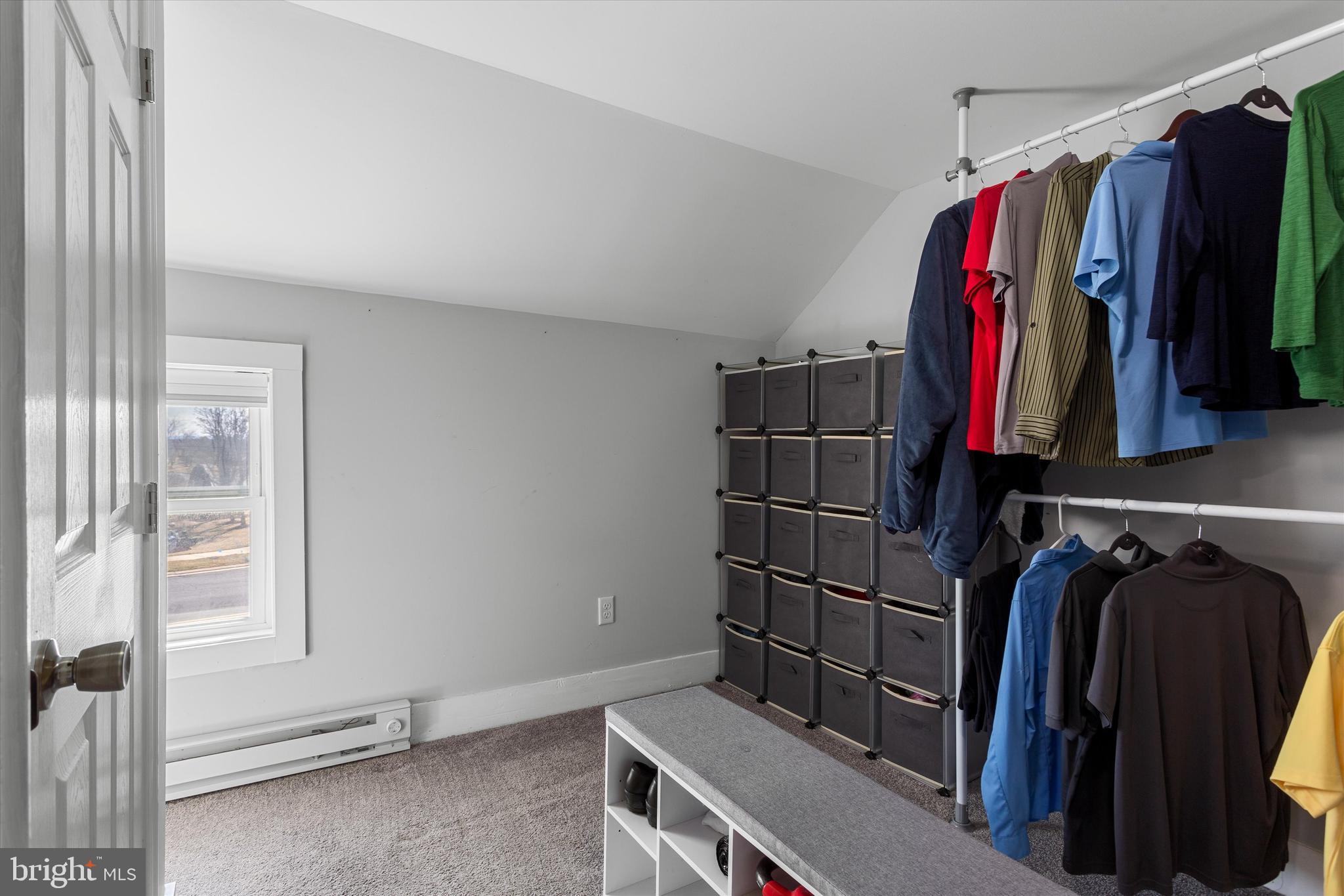 337 Old Charles Town Road Stephenson, VA 22656 - Photo 18 of 27 a view of walk in closet with clothes and shoes