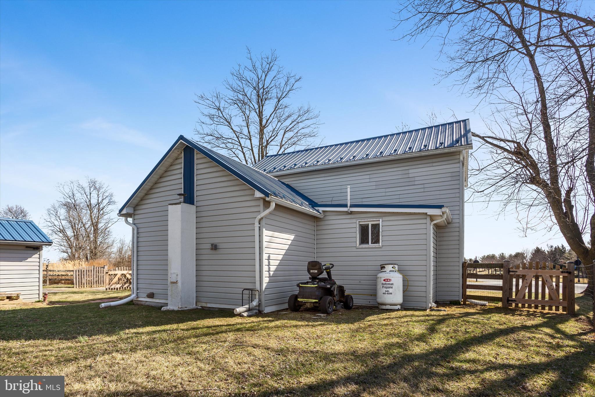 337 Old Charles Town Road Stephenson, VA 22656 - Photo 25 of 27 a view of a house with a patio