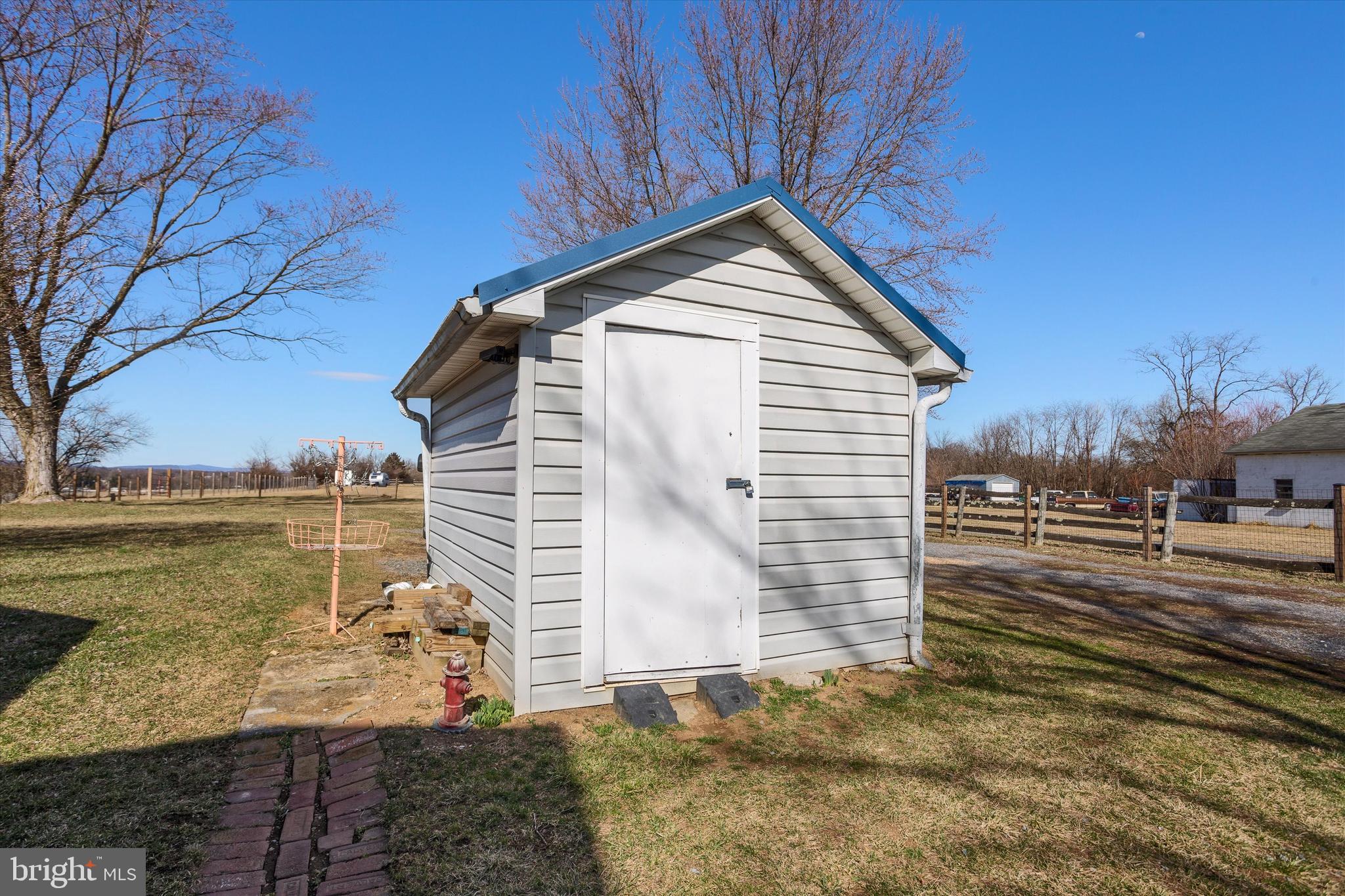 337 Old Charles Town Road Stephenson, VA 22656 - Photo 27 of 27 a view of a house with a yard