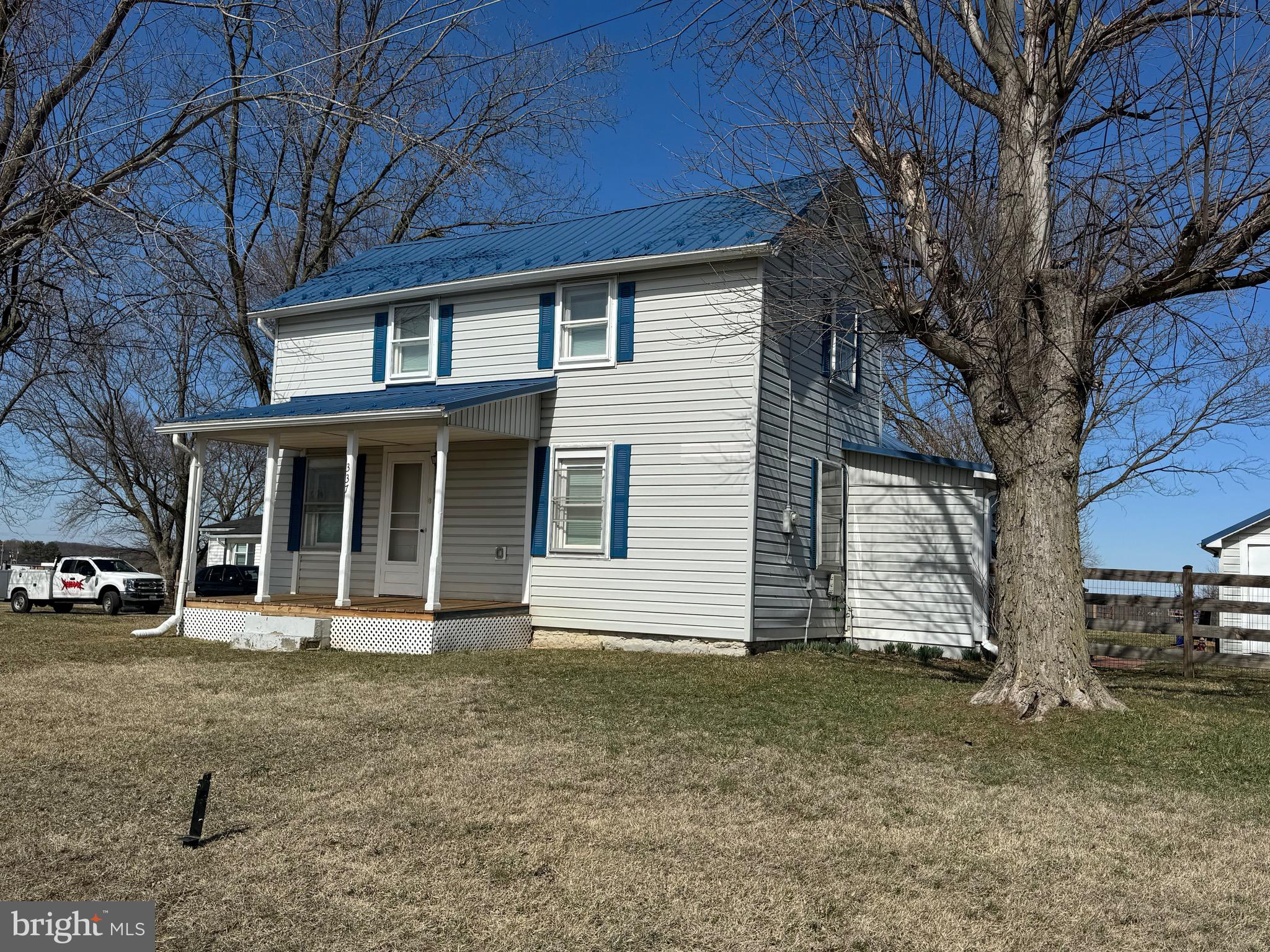 337 Old Charles Town Road Stephenson, VA 22656 - Photo 3 of 27 a front view of a house with a yard