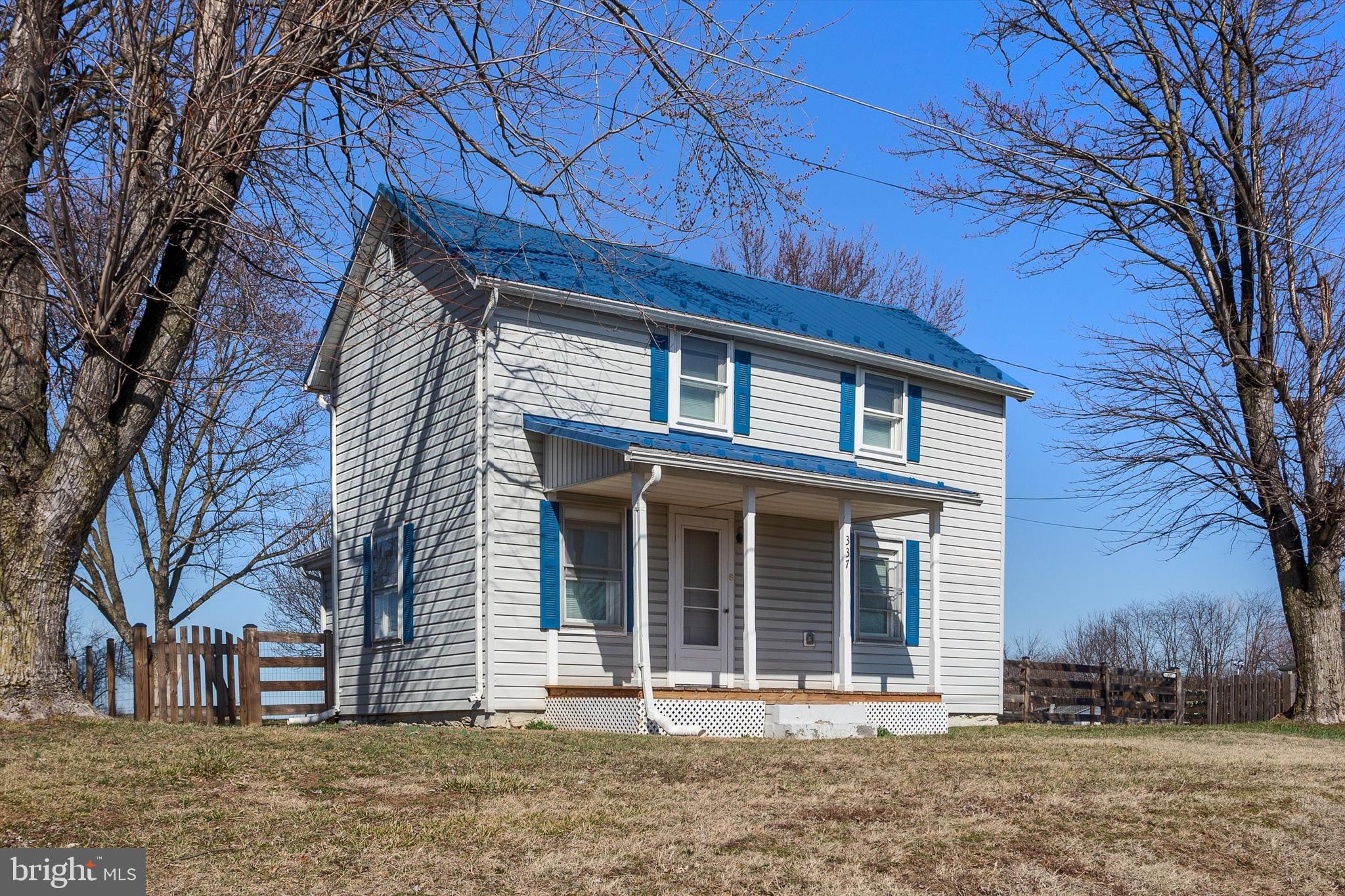 337 Old Charles Town Road Stephenson, VA 22656 - Photo 9 of 27 a front view of a house with a yard