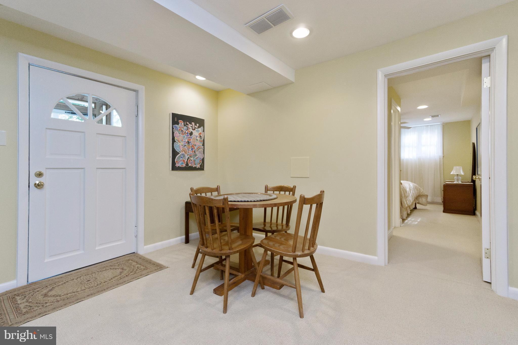 230 Randolph Road Silver Spring, MD 20904 - Photo 17 of 24 a view of a room with furniture and wooden floor