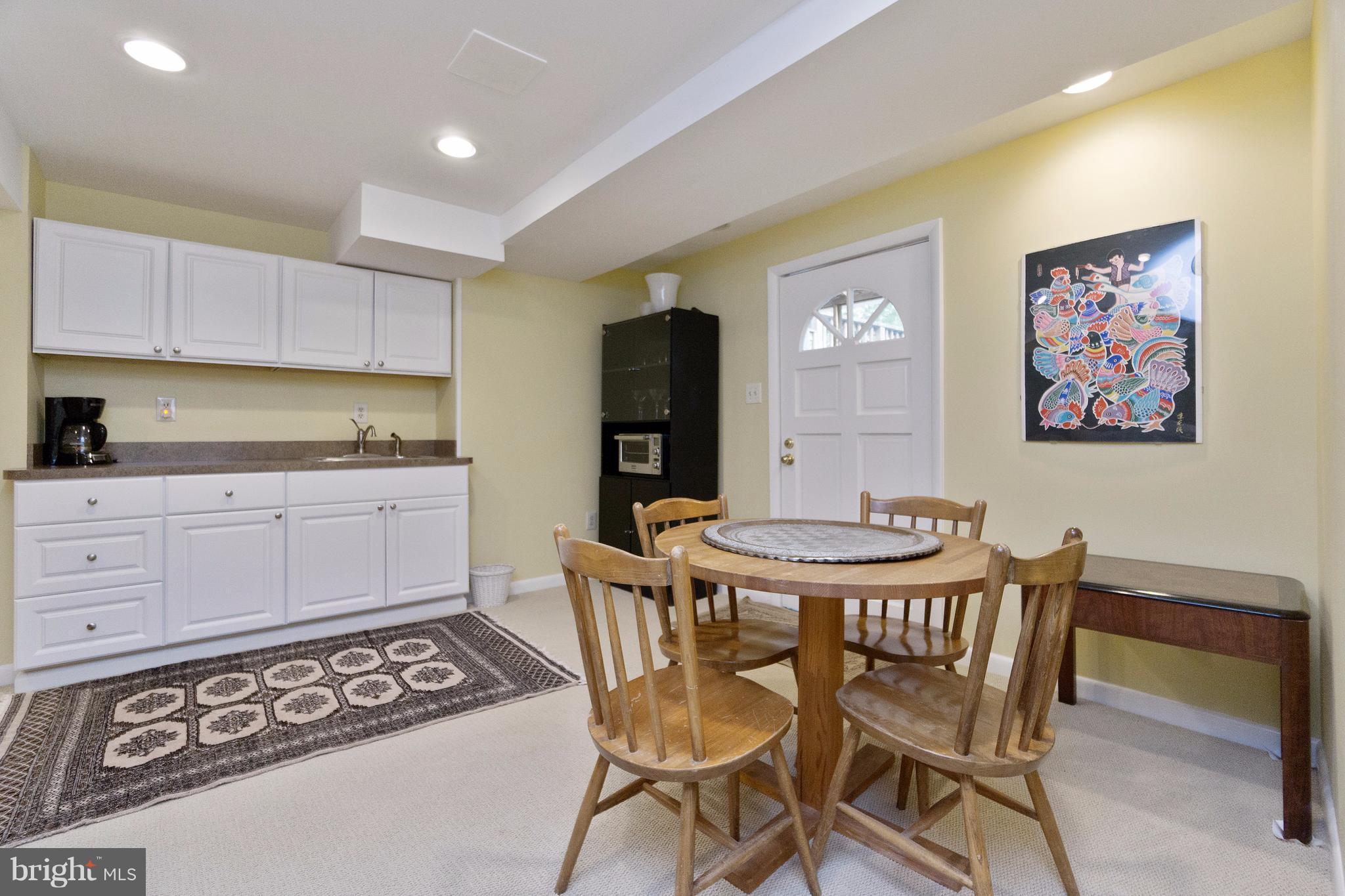 230 Randolph Road Silver Spring, MD 20904 - Photo 18 of 24 a view of a dining room with furniture and wooden floor