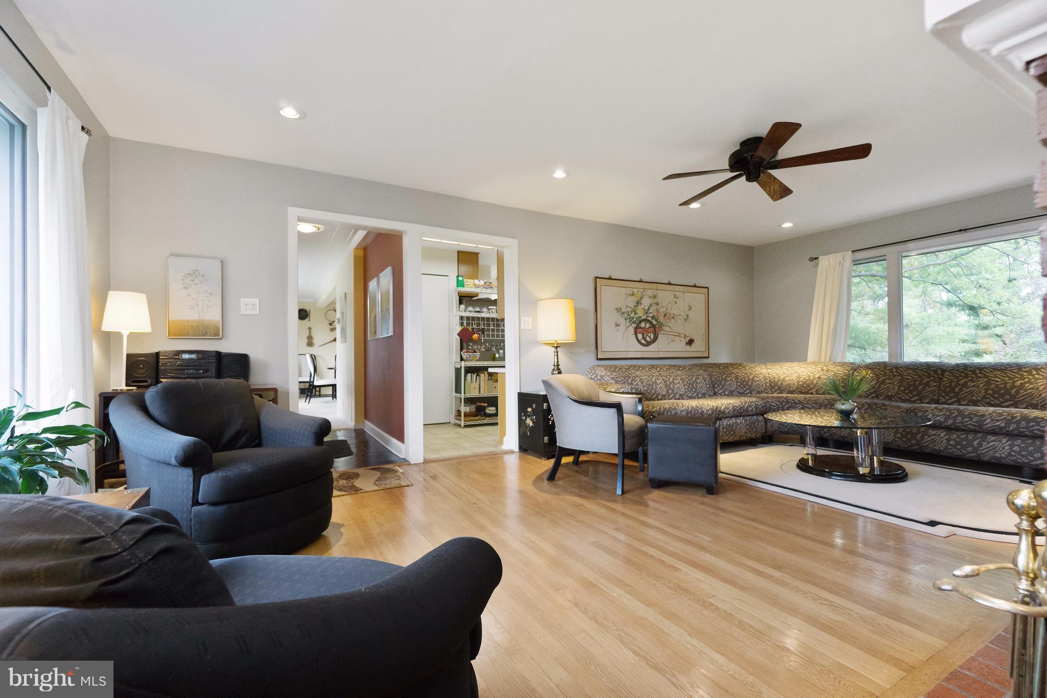 230 Randolph Road Silver Spring, MD 20904 - Photo 6 of 24 a living room with furniture and a large window