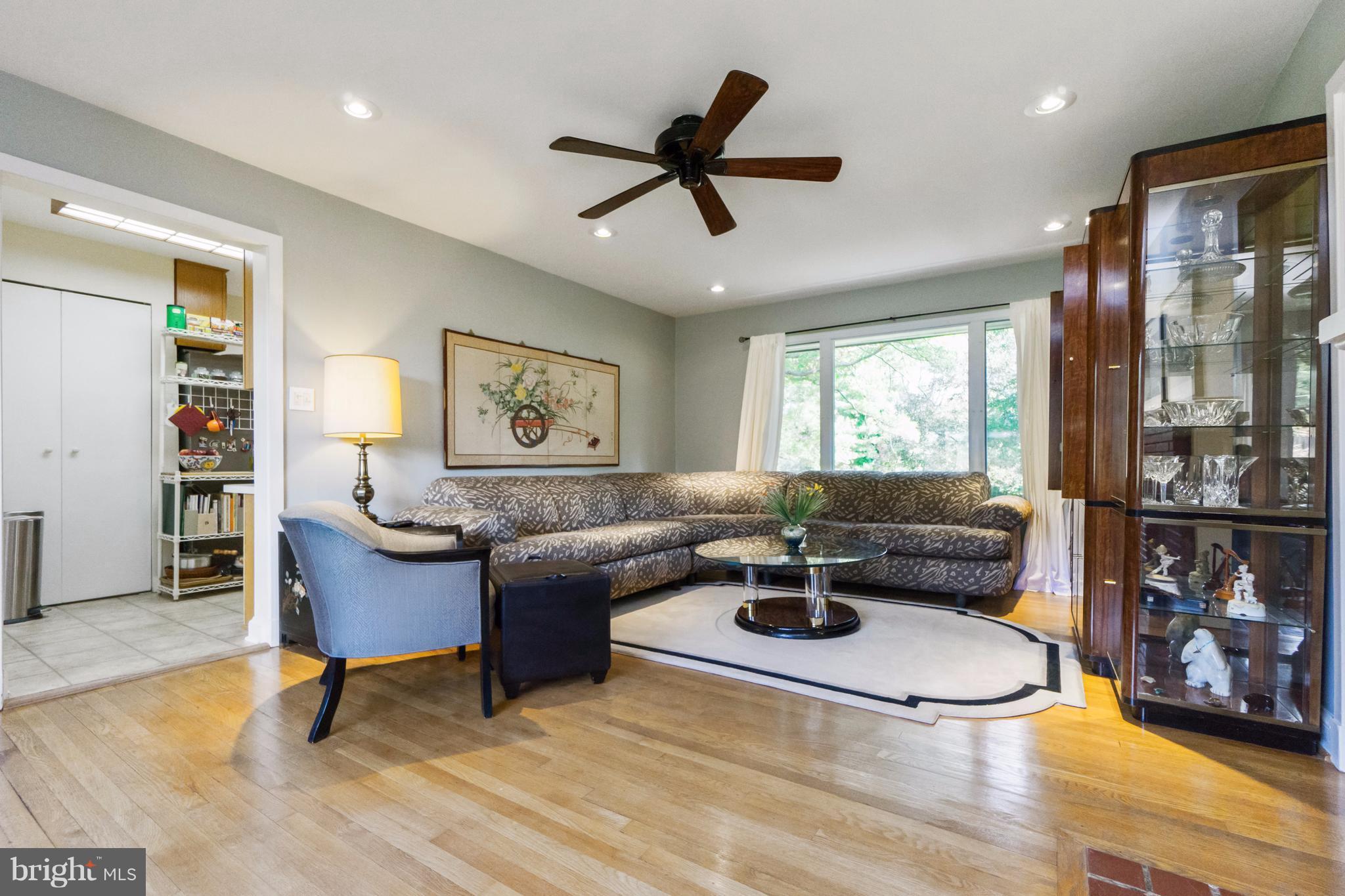 230 Randolph Road Silver Spring, MD 20904 - Photo 7 of 24 a living room with furniture and a window