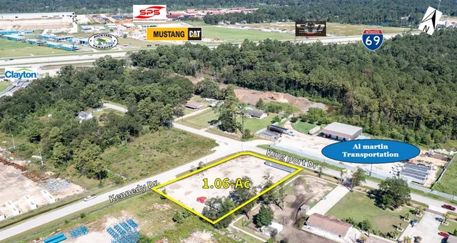 swimming pool view with a seating space