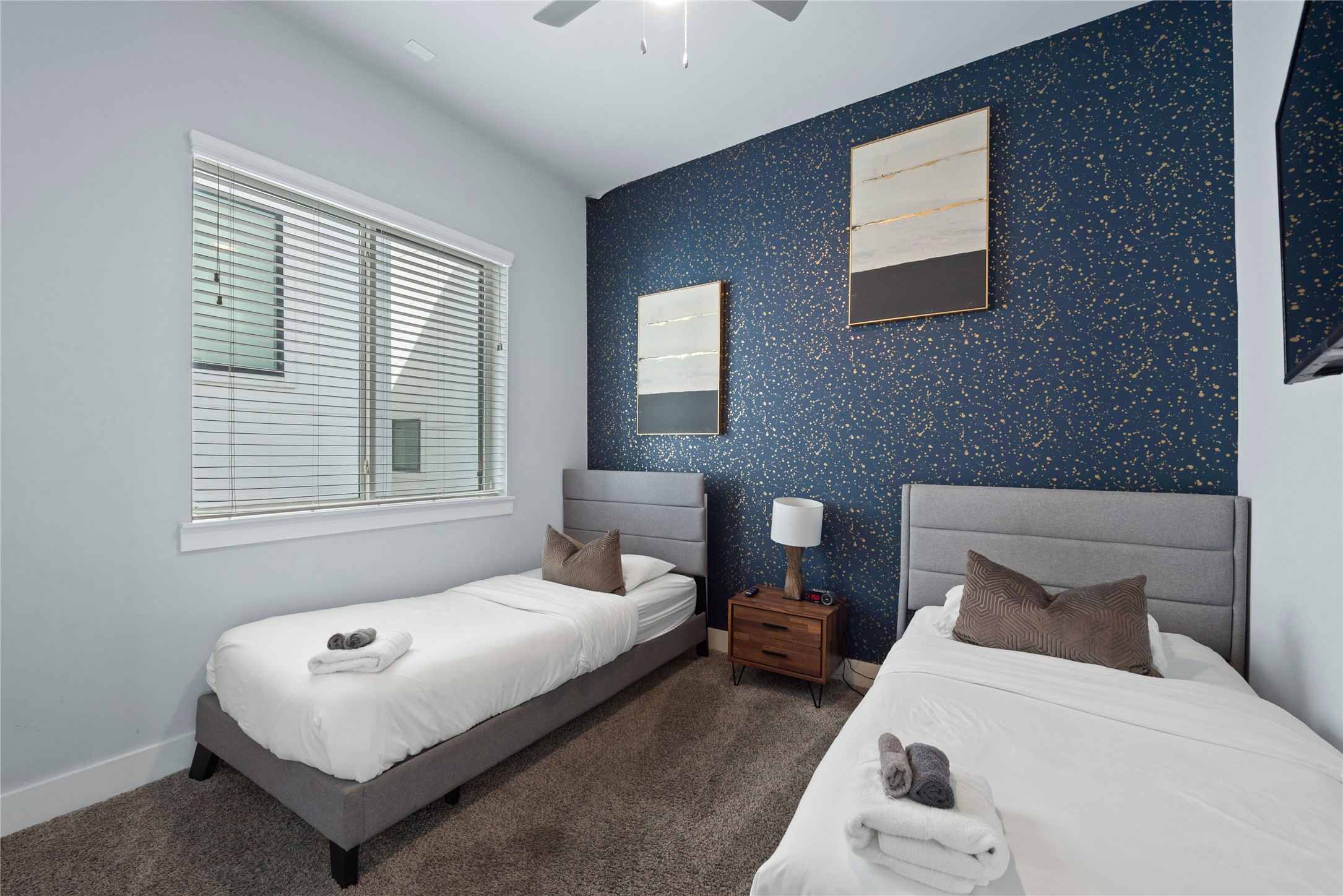 3365 Daphne Street Houston, TX 77021 - Photo 23 of 26 a bedroom with a bed a mirror and a window