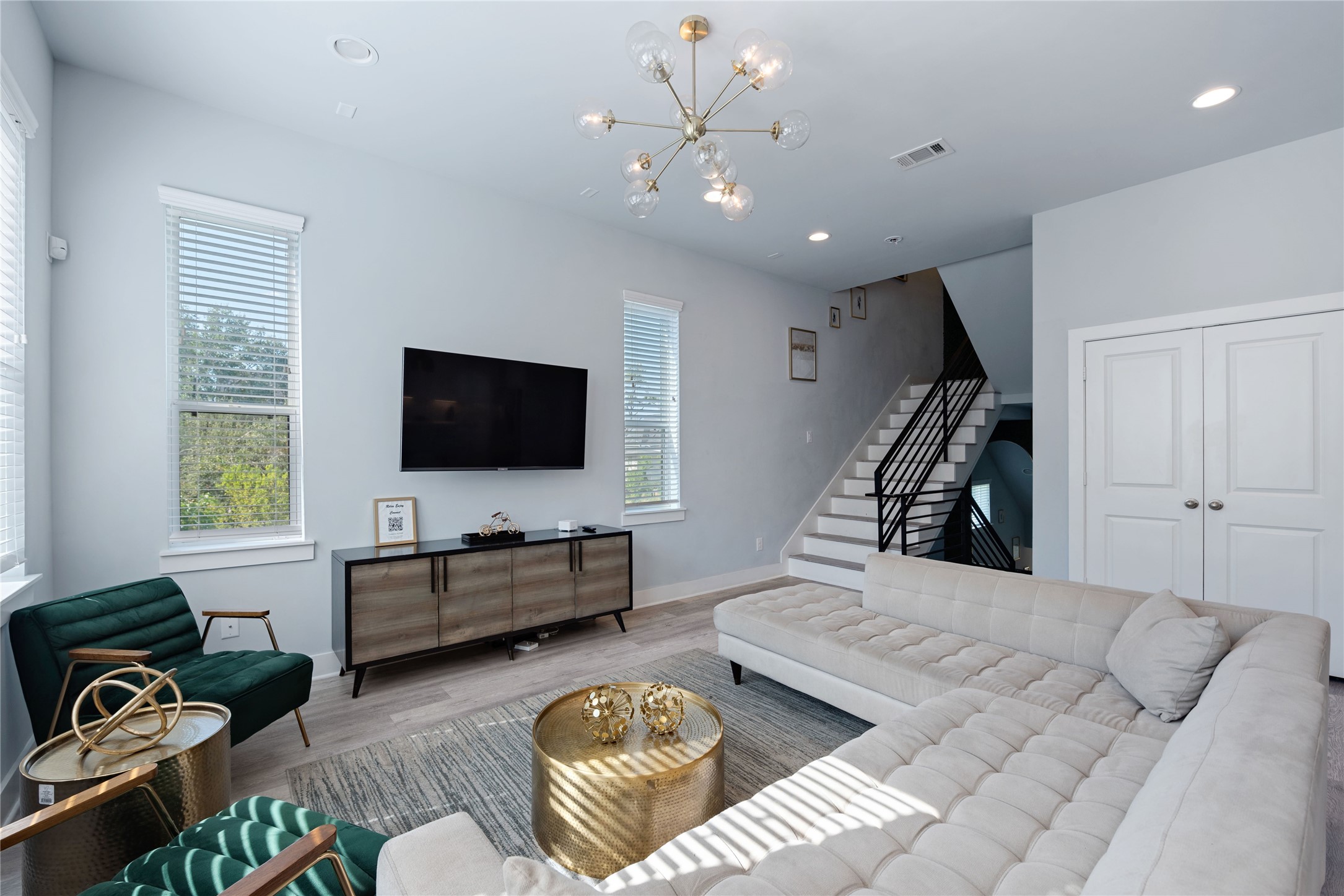 3365 Daphne Street Houston, TX 77021 - Photo 7 of 26 a living room with furniture and a flat screen tv