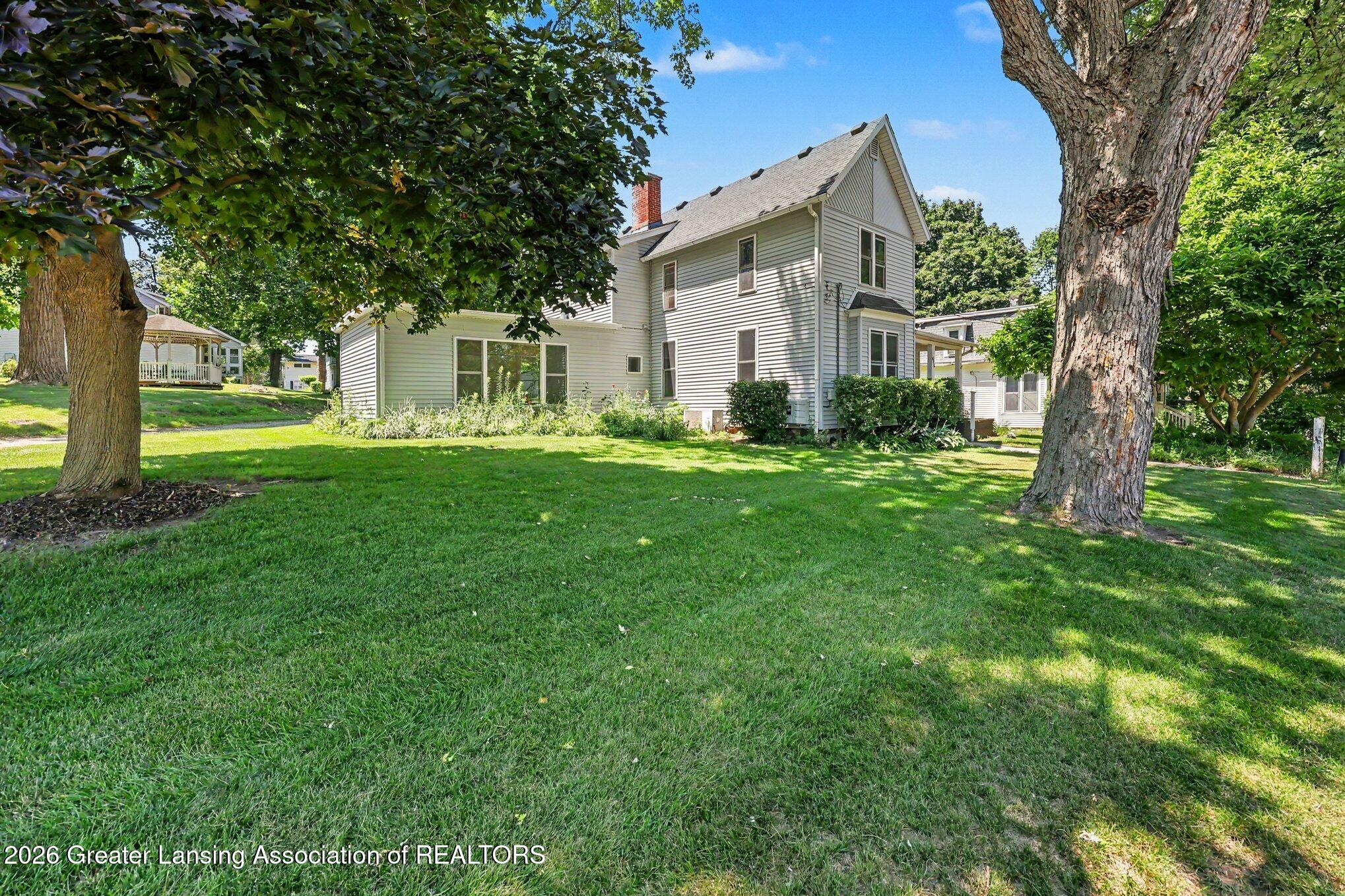 616 South Clinton Street Stockbridge, MI 49285 - Photo 22 of 24 Side