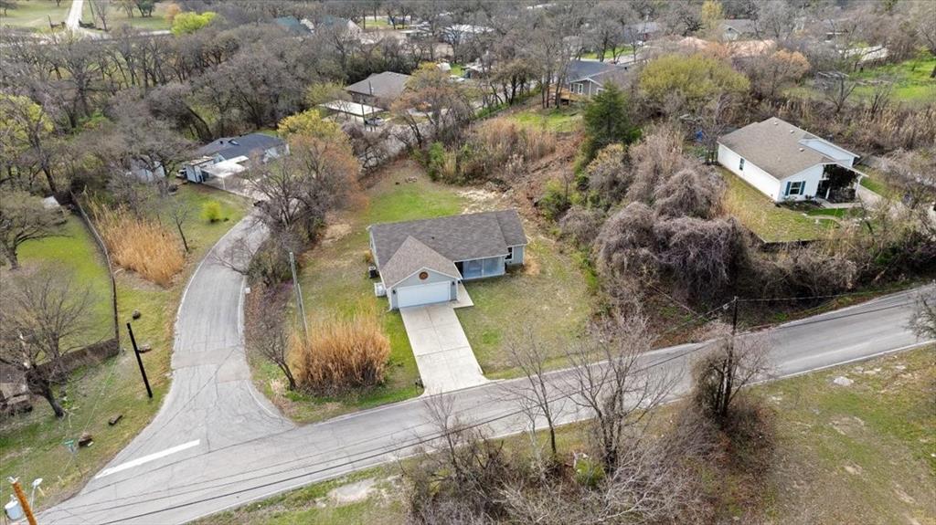 512 Alameda Road Azle, TX 76020 - Photo 27 of 28 an aerial view of residential houses with outdoor space
