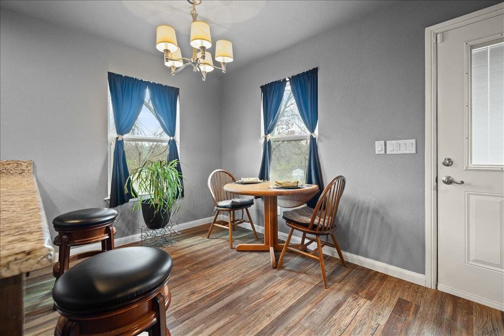 512 Alameda Road Azle, TX 76020 - Photo 6 of 28 a dining room with furniture and window