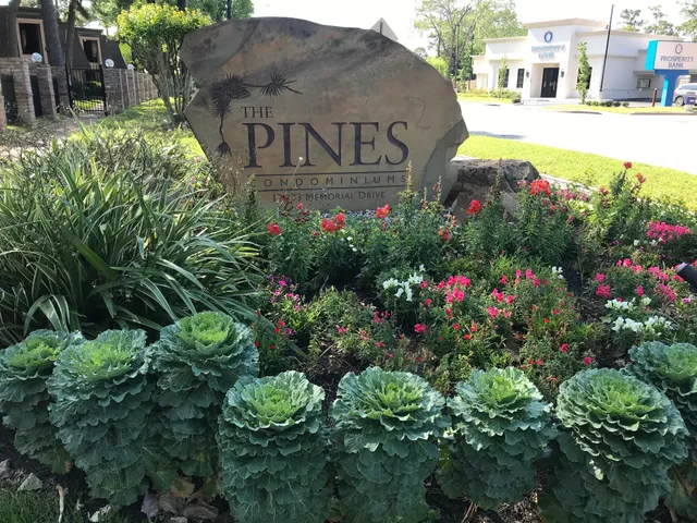a view of a sign in front of house