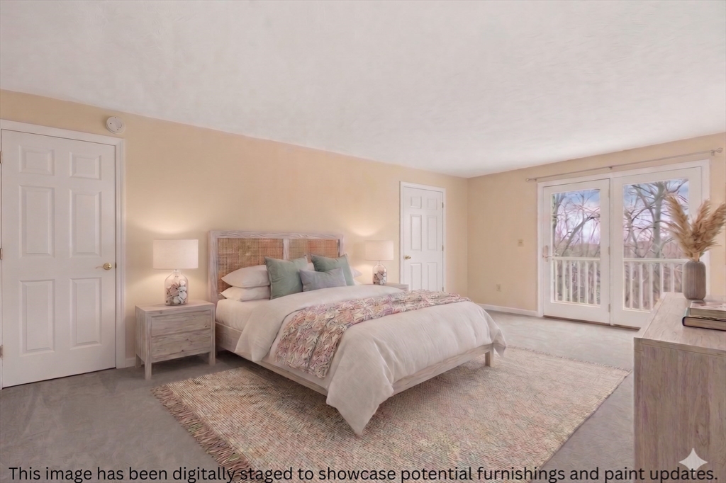32 Howe Road Cohasset, MA 02025 - Photo 10 of 24 a bedroom with a large bed and a couch