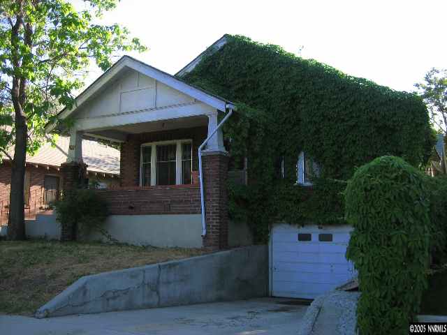 1023 Plumas Street Reno, NV 89509 - Photo 1 of 1 a front view of a house with a yard