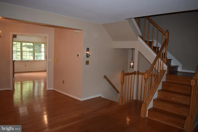 a view of entryway with wooden floor