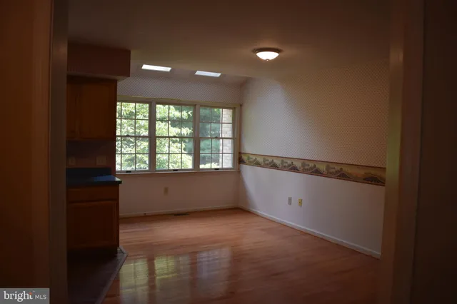 an empty room with windows